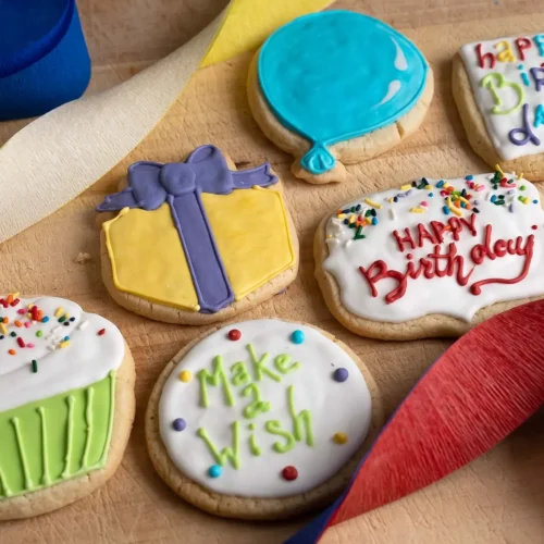 Bakery Birthday Box — Celebrate their big day in style with this box of birthday cookies! This box features six sugar cookies hand-decorated with layers of royal icing, making them the best-baked goods for a birthday celebration around!